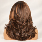 Back view of a brown highlight butterfly cut wig showing graduated layers and curved ends.