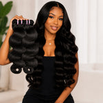 Black woman holding 3 bundles of Virgin Body Wave Hair Bundles Double Drawn with flat bundle tops and soft natural body wave texture
