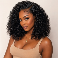Black woman wearing Raw Pixie Curly Bundles Double Drawn with full defined black curls and a natural voluminous finish by UrbanChichair