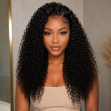 Black woman wearing UrbanChichair Virgin Pixie Curly Bundles with full defined curls and natural black human hair texture.