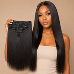 Black woman wearing UrbanChichair Yaki Straight clip-in hair extensions while holding the matching natural black clip-in hair set