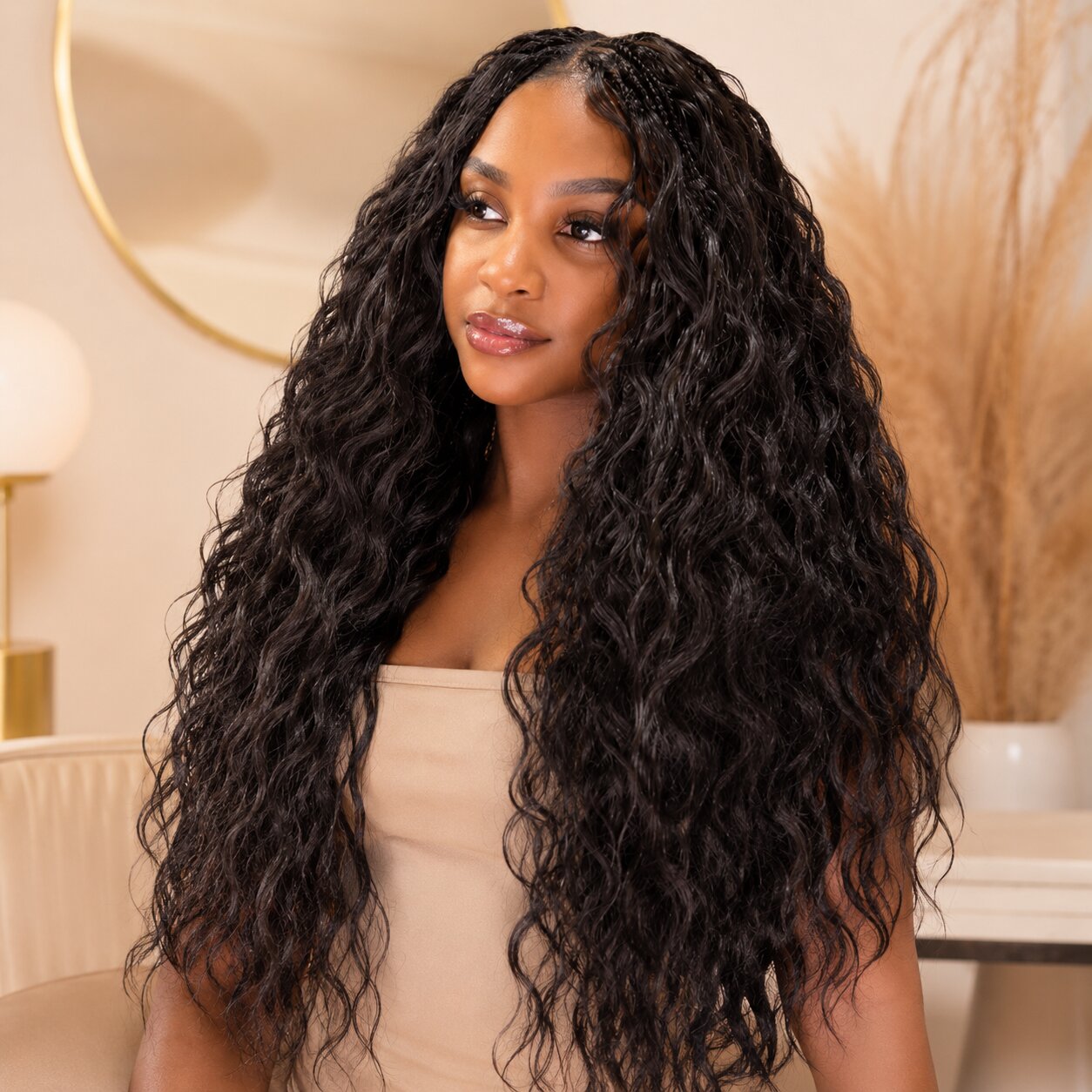 Black woman wearing long natural body wave crochet human hair extensions with soft glossy waves, seamless blend, premium beauty editorial hairstyle look.