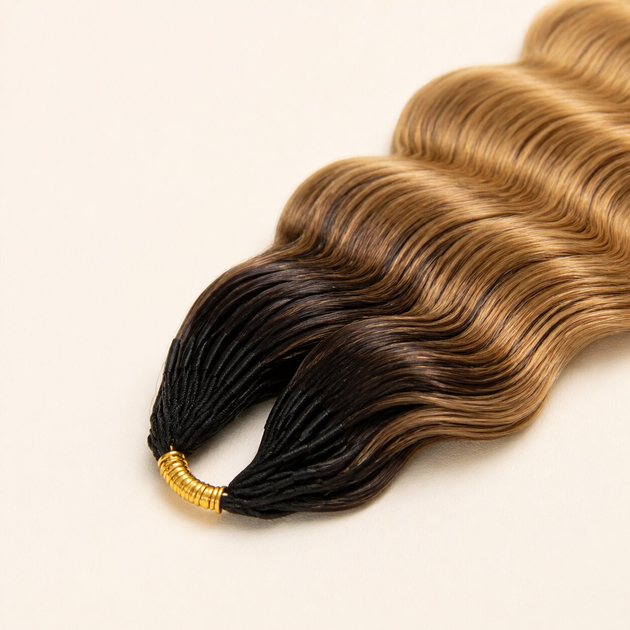 Close-up of #T1B/27 dark-root ombre blonde loose deep wave human hair texture
