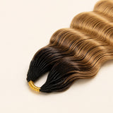 Close-up of #T1B/27 dark-root ombre blonde loose deep wave human hair texture