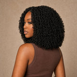 Close-up of UrbanChichair kinky curly Remy human hair showing defined multi-textured ringlets and natural shine