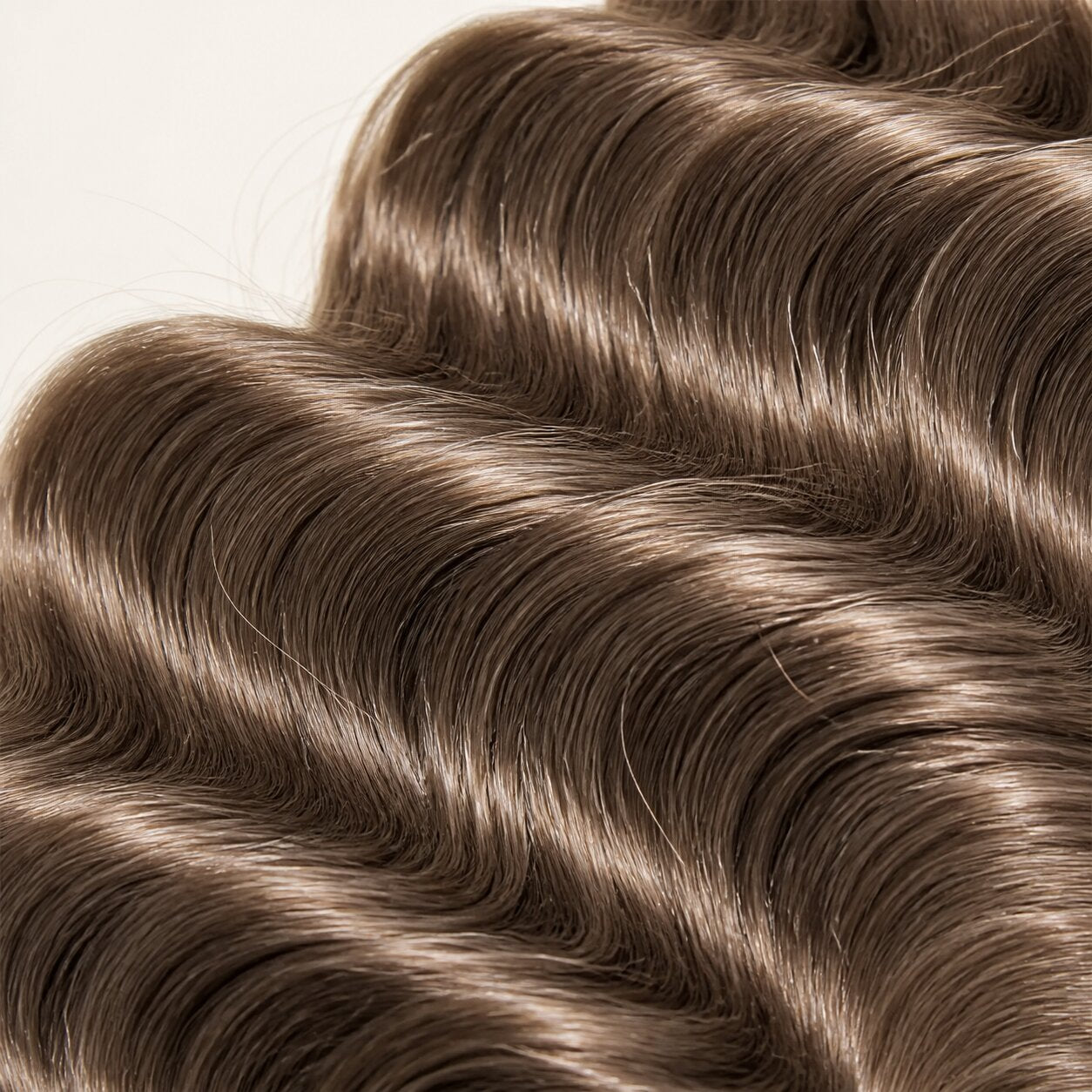 Close-up of defined Color #8 light brown loose deep wave human hair texture