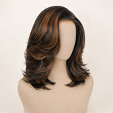 Close-up of smooth dark brown human hair with warm caramel highlights and layered feathered ends.