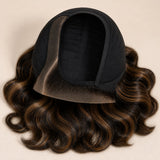 Close-up of the left C part and pre-plucked hairline on a brown highlight HD lace wig.