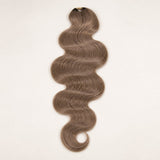 Close-up of the pre-looped construction on #8 light brown body wave crochet hair