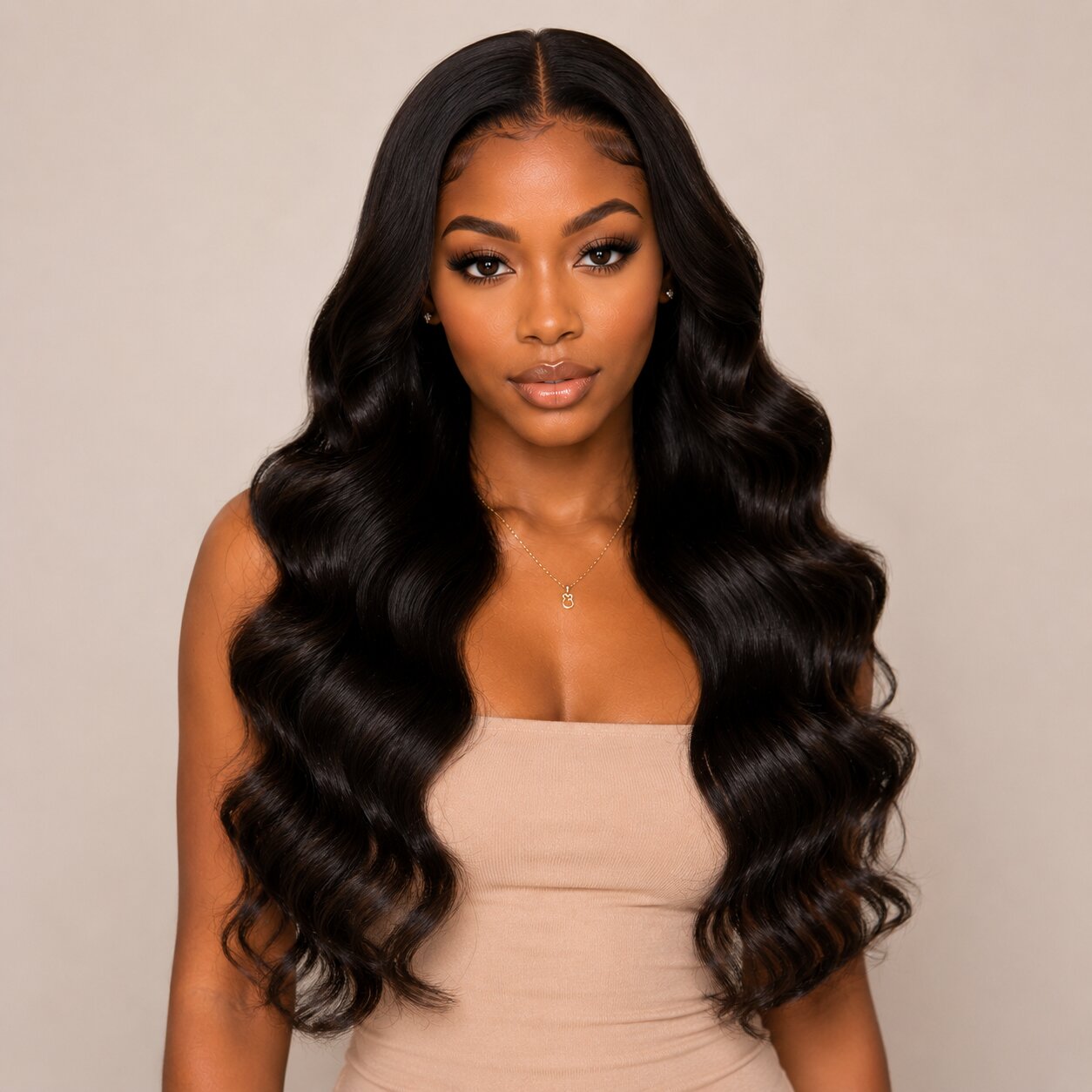 Front view model wearing UrbanChichair Body Wave Invisible Tape In Hair Extensions with long glossy black waves and natural seamless volume