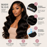 Model wearing UrbanChichair Body Wave Invisible Tape In Hair Extensions with full voluminous black waves, seamless blend, and natural shine