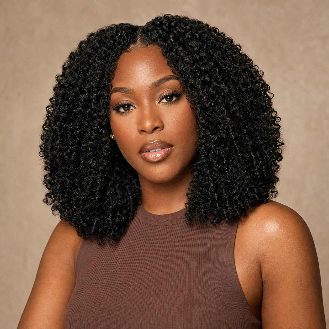 Side and back view of UrbanChichair kinky curly crochet human hair showing full, even curl coverage