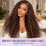 UrbanChicHair brown highlight Funmi curly human hair wig modeled with long defined curls, caramel highlights, and a natural side part.