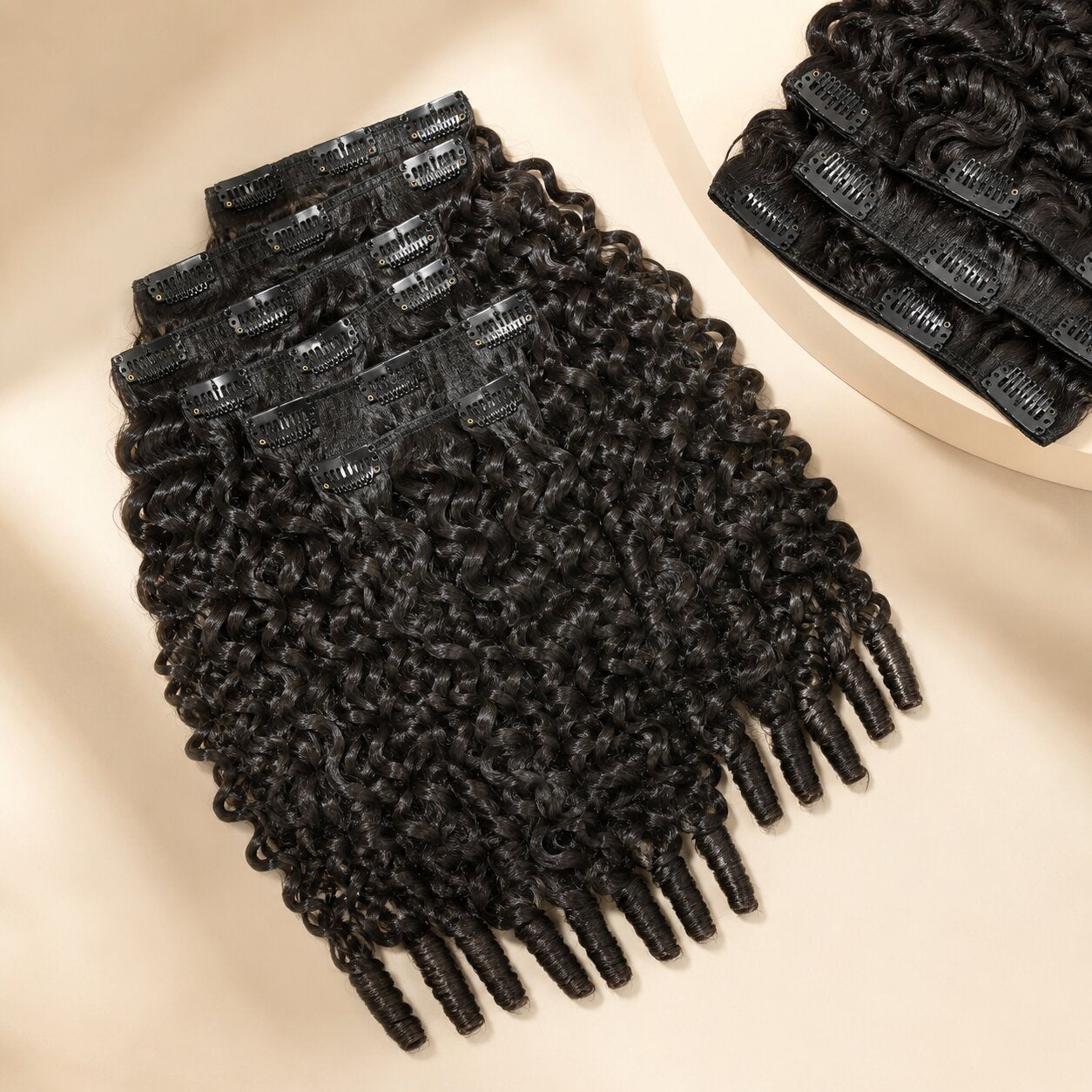 UrbanChichair Burmese Curly Finger Coil Ends Seamless Clip-In Human Hair Extensions in natural black, displayed in a premium flat lay with defined curls and visible clip-in wefts.