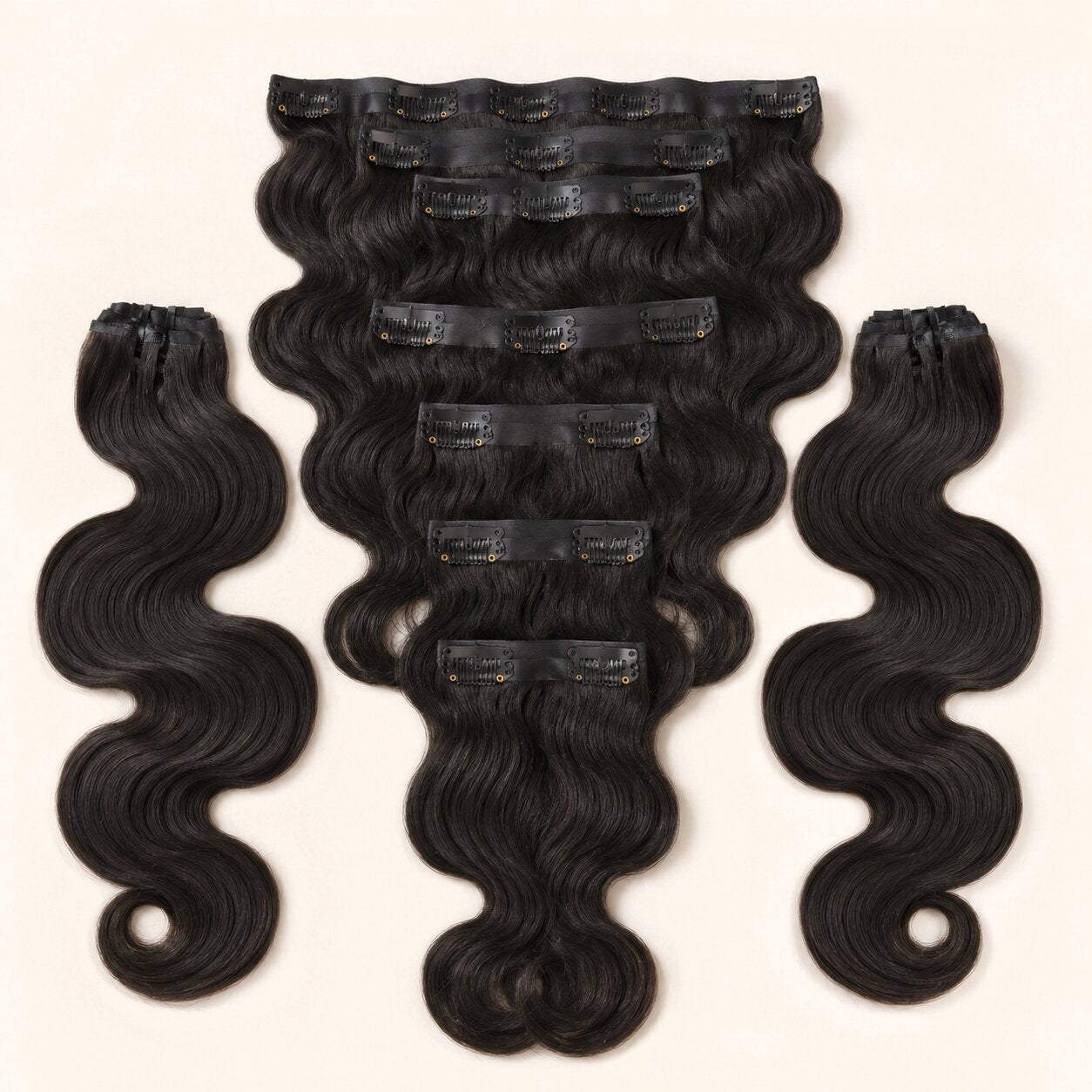 UrbanChichair Soft Body Wave Seamless Clip-in Human Hair Extensions in natural black, flat lay showing glossy body wave texture and secure clip-in wefts.