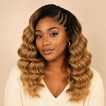 UrbanChichair #T1B/27 ombre blonde loose deep wave human crochet hair bundle on an ivory background