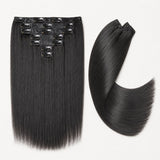 UrbanChichair Yaki Straight invisible clip-in human hair extensions flat lay with natural black textured straight hair and secure clips