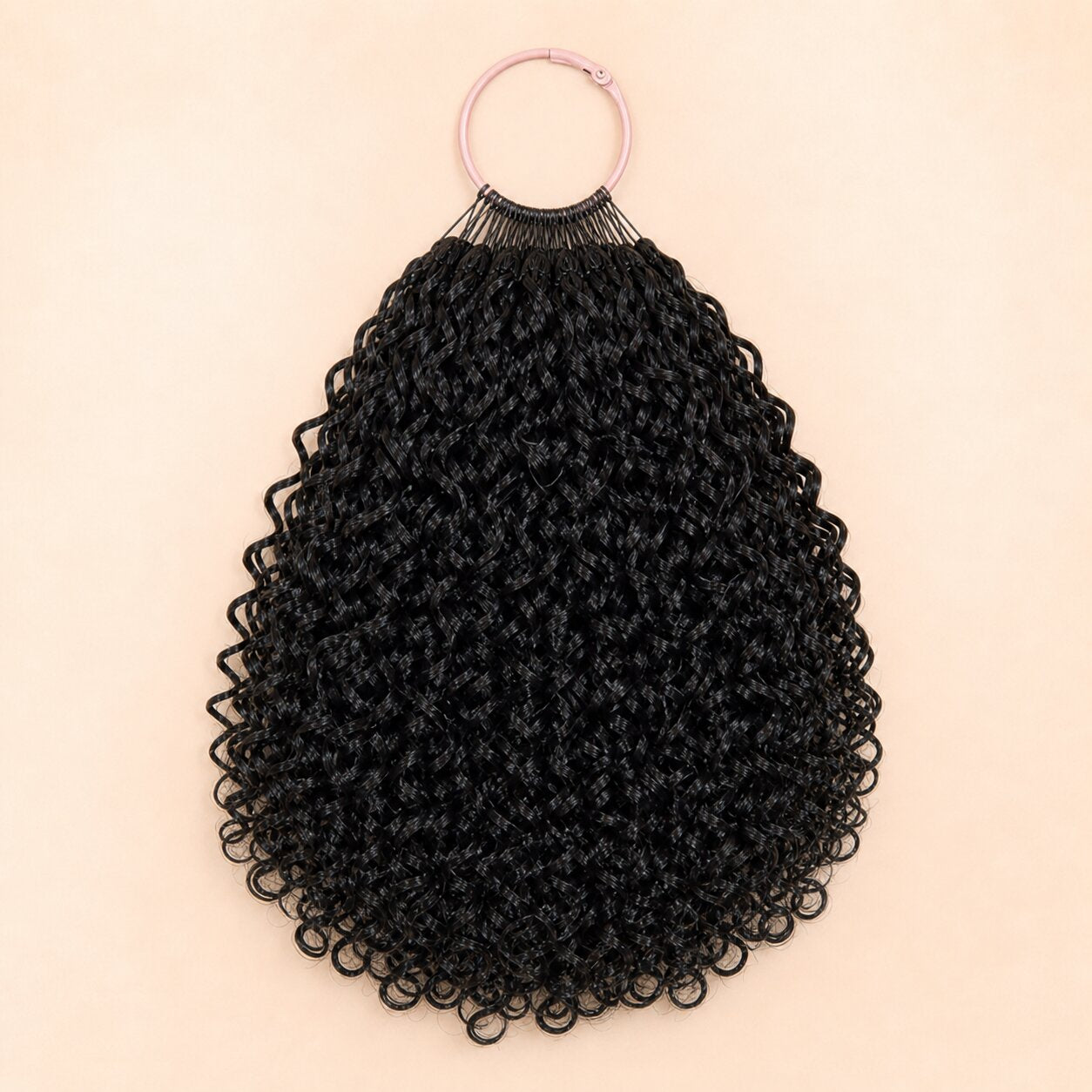 UrbanChichair natural black Ramen Curl human hair crochet extensions displayed on a blush pink ring