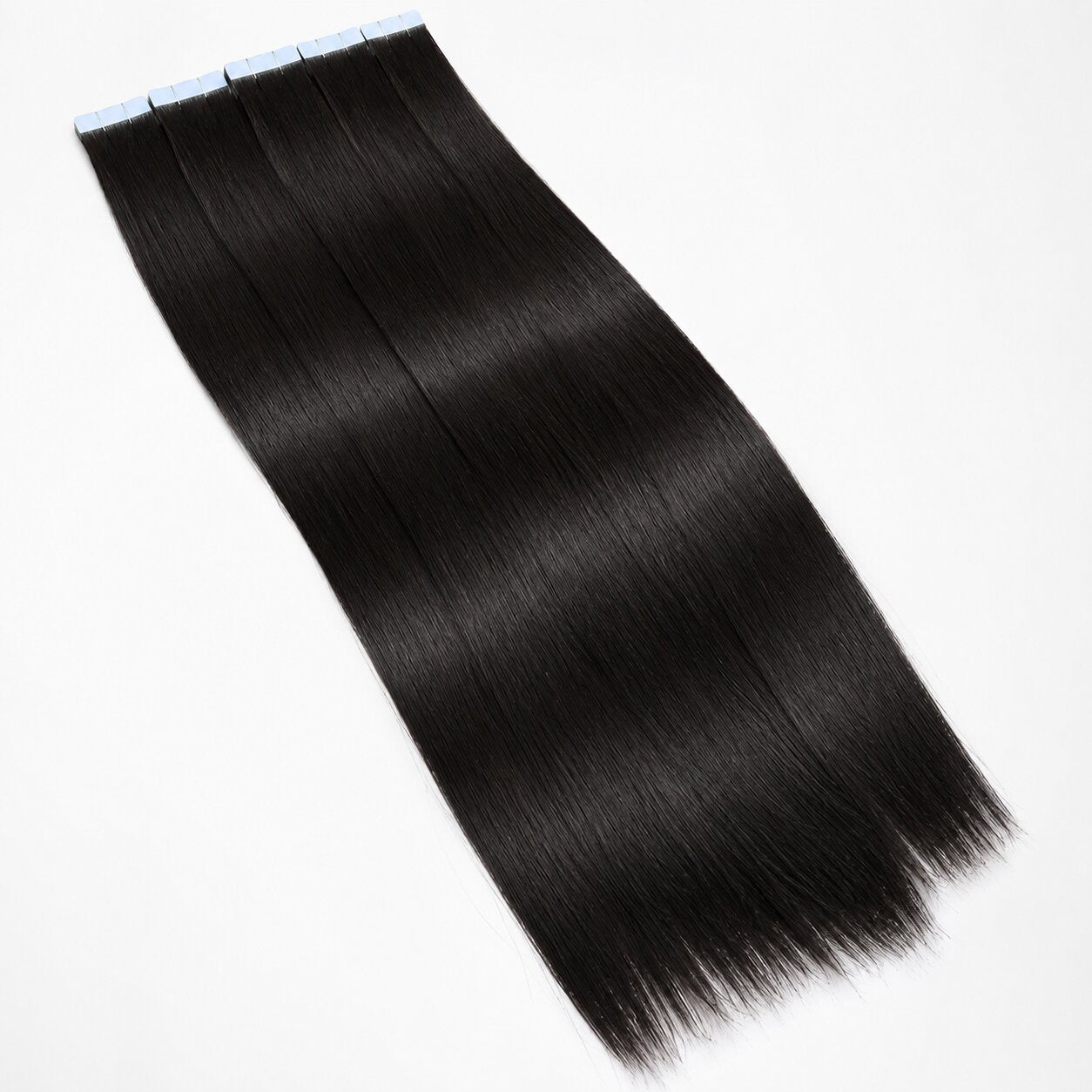UrbanChichair straight invisible tape in human hair extensions displayed on a white background with smooth silky texture.