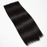 UrbanChichair straight invisible tape in human hair extensions displayed on a white background with smooth silky texture.