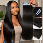 Young Black woman holding straight invisible tape in hair extensions with sleek glossy black hair and natural seamless texture.